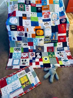 Memory Quilt Made from baby boy clothes.