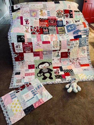 Memory Quilt Made from baby girl clothes. Memory Quilt Made from baby girl clothes.